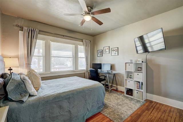 2233 W Eubanks St, Oklahoma City, OK 73112 - bedroom with wood finished floors and ceiling fan
