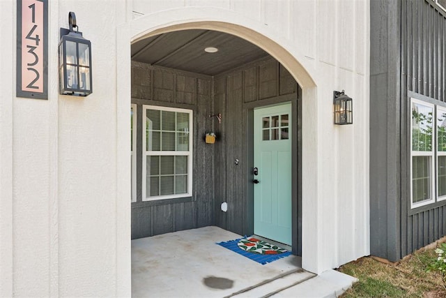 1432 NE Euclid St, Oklahoma City, OK 73117 - property entrance with covered porch and board and batten siding