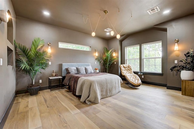 1432 NE Euclid St, Oklahoma City, OK 73117 - bedroom with light wood-type flooring and recessed lighting