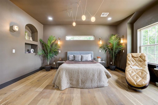 1432 NE Euclid St, Oklahoma City, OK 73117 - bedroom with wood finished floors and recessed lighting