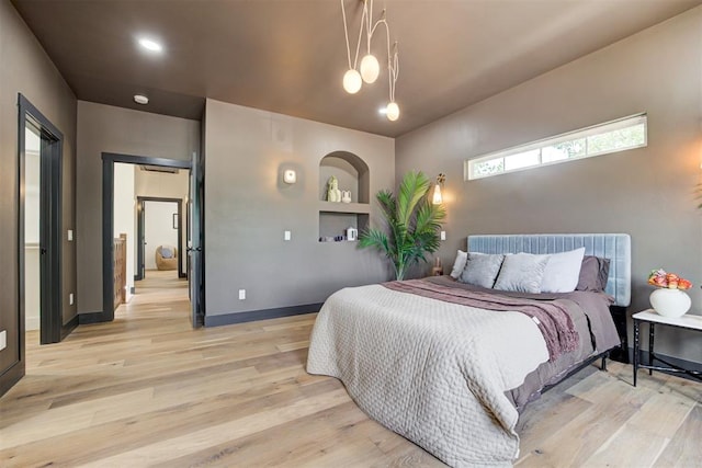 1432 NE Euclid St, Oklahoma City, OK 73117 - bedroom with light wood-style floors and baseboards