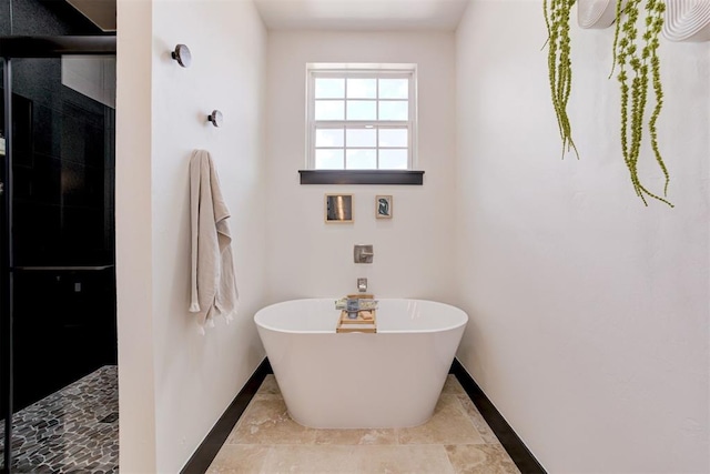 1432 NE Euclid St, Oklahoma City, OK 73117 - full bathroom with a soaking tub and a tile shower
