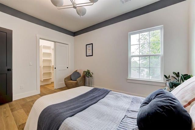 1432 NE Euclid St, Oklahoma City, OK 73117 - bedroom with light wood finished floors and a closet
