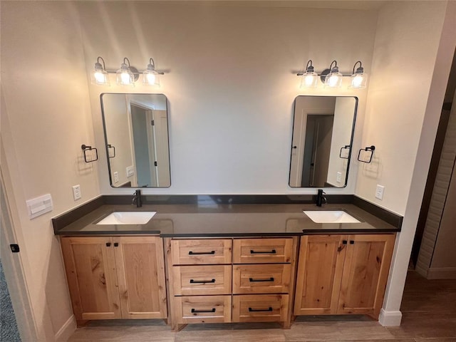11713 NW 105th St, Yukon, OK 73099 - full bath featuring double vanity and wood finished floors