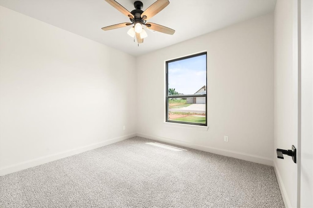 11713 NW 105th St, Yukon, OK 73099 - spare room featuring carpet and ceiling fan