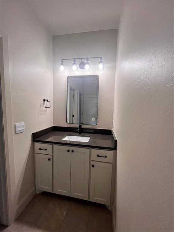 11713 NW 105th St, Yukon, OK 73099 - bathroom featuring vanity and baseboards