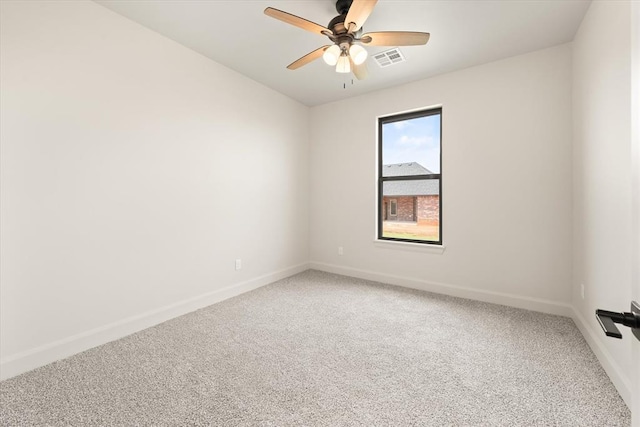 11713 NW 105th St, Yukon, OK 73099 - spare room featuring light carpet and ceiling fan