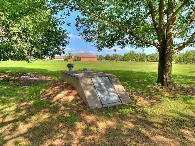 73 Sonata Ln, Shawnee, OK 74804 - entry to storm shelter with a yard