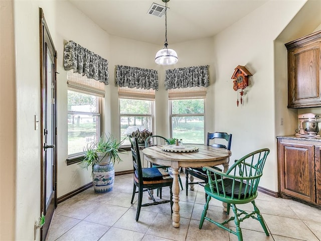 73 Sonata Ln, Shawnee, OK 74804 - dining room featuring light tile patterned floors and baseboards