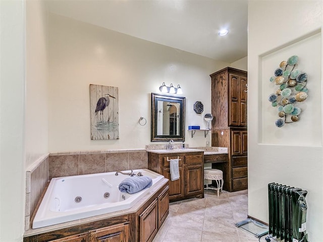73 Sonata Ln, Shawnee, OK 74804 - full bath with radiator heating unit, a jetted tub, vanity, and tile patterned floors