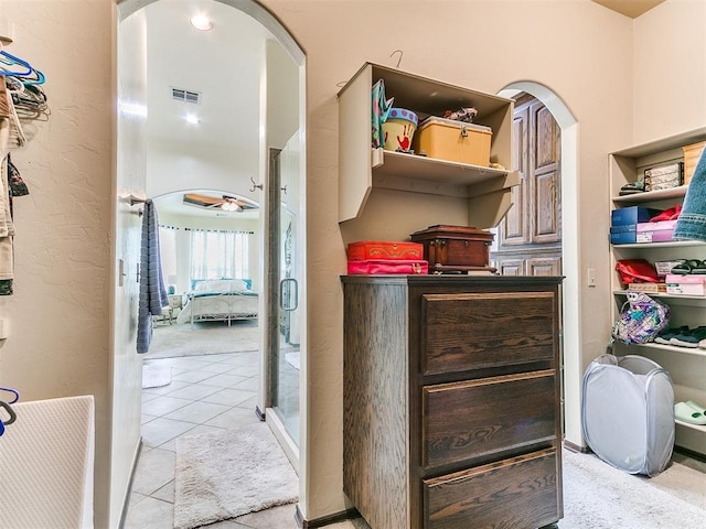 73 Sonata Ln, Shawnee, OK 74804 - spacious closet with arched walkways and light tile patterned floors