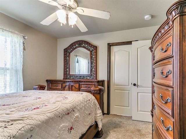 73 Sonata Ln, Shawnee, OK 74804 - bedroom with light carpet and a ceiling fan