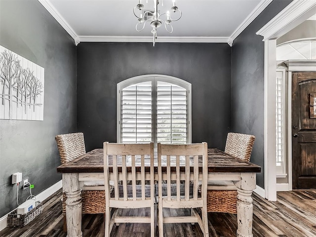 2044 Yorkshire Dr, Midwest City, OK 73130 - dining room with healthy amount of natural light, wood finished floors, a chandelier, and crown molding