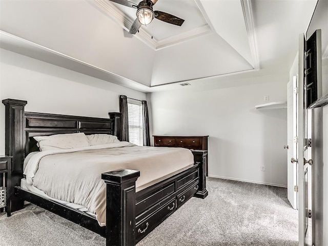 2044 Yorkshire Dr, Midwest City, OK 73130 - carpeted bedroom with a tray ceiling, ceiling fan, and ornamental molding