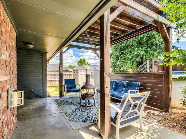 2044 Yorkshire Dr, Midwest City, OK 73130 - fenced backyard with a patio, a shed, and an outdoor hangout area