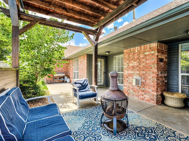 2044 Yorkshire Dr, Midwest City, OK 73130 - view of patio with an outdoor fire pit