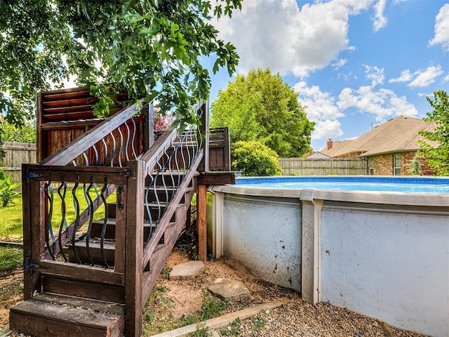 2044 Yorkshire Dr, Midwest City, OK 73130 - deck with a fenced backyard and stairs