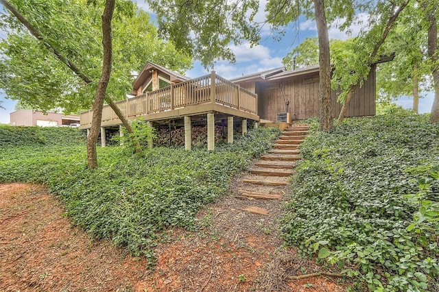 22117 E 1250th Rd, Rocky, OK 73661 - rear view of property featuring stairway and a wooden deck