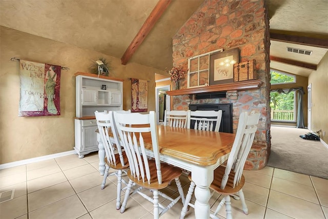 22117 E 1250th Rd, Rocky, OK 73661 - dining room featuring light tile patterned flooring and a fireplace