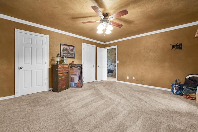 22117 E 1250th Rd, Rocky, OK 73661 - unfurnished bedroom featuring carpet floors, crown molding, a textured ceiling, and ceiling fan