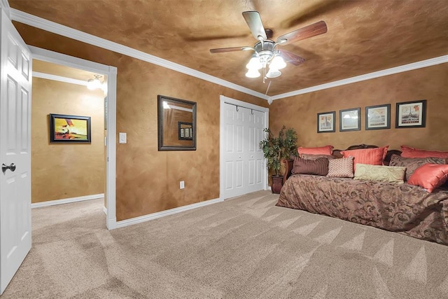 22117 E 1250th Rd, Rocky, OK 73661 - bedroom with carpet floors, ceiling fan, a closet, and ornamental molding