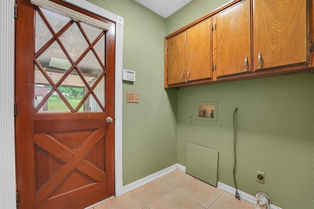 22117 E 1250th Rd, Rocky, OK 73661 - washroom with cabinet space, electric dryer hookup, washer hookup, and light tile patterned flooring