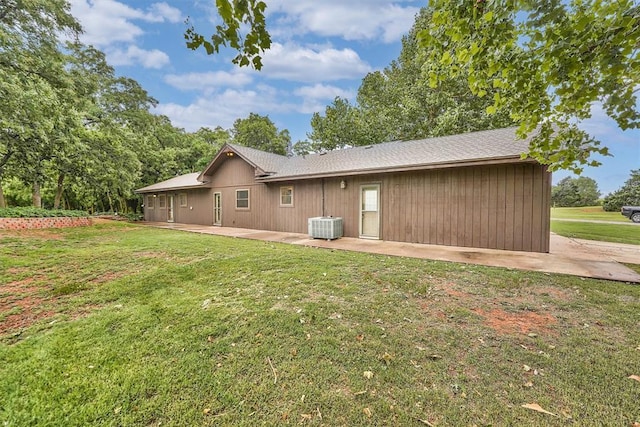 22117 E 1250th Rd, Rocky, OK 73661 - rear view of property with a patio area, a yard, and roof with shingles