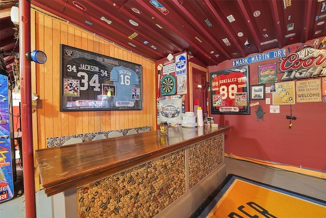 22117 E 1250th Rd, Rocky, OK 73661 - bar featuring vaulted ceiling and wood walls