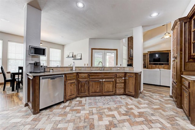 11409 SW 109th St, Mustang, OK 73064 - kitchen featuring dishwasher, open floor plan, light countertops, ceiling fan, and recessed lighting
