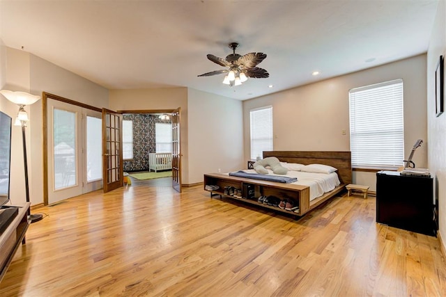 11409 SW 109th St, Mustang, OK 73064 - bedroom with light wood-style floors, ceiling fan, recessed lighting, and radiator heating unit