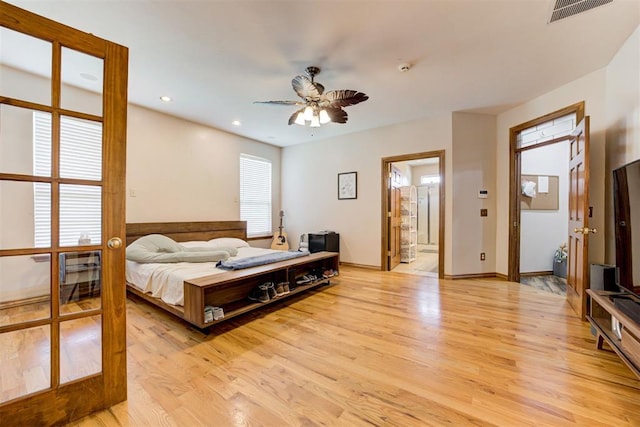11409 SW 109th St, Mustang, OK 73064 - bedroom featuring light wood-type flooring, recessed lighting, and ensuite bathroom