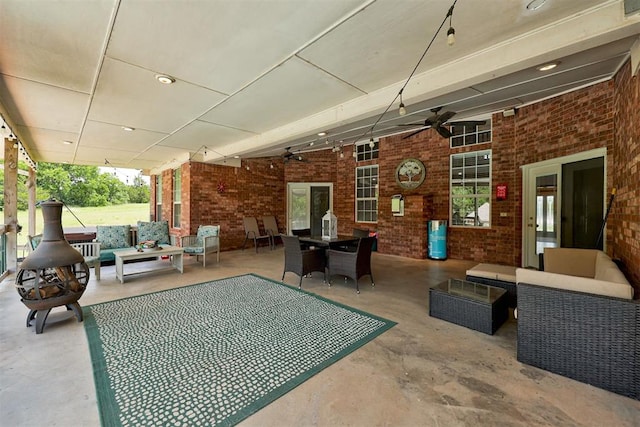 11409 SW 109th St, Mustang, OK 73064 - view of patio / terrace featuring ceiling fan, an outdoor hangout area, and outdoor dining space