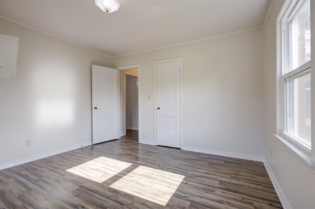 521 NW 50th St, Oklahoma City, OK 73118 - empty room with wood finished floors and ornamental molding