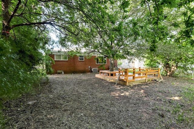 521 NW 50th St, Oklahoma City, OK 73118 - view of yard featuring a wooden deck