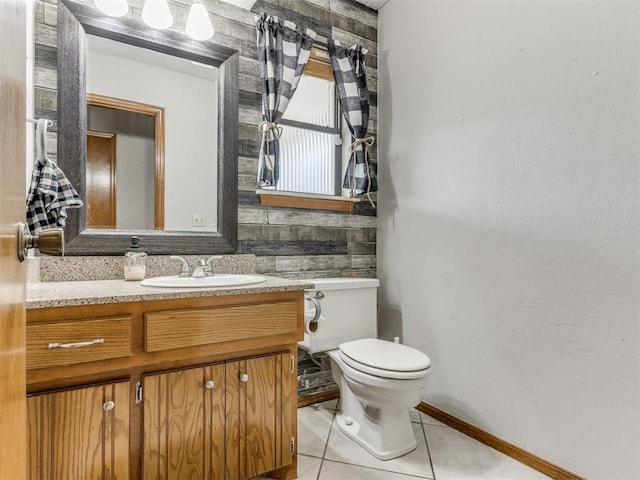700 S Willowood Dr, Yukon, OK 73099 - bathroom featuring tile patterned floors and vanity
