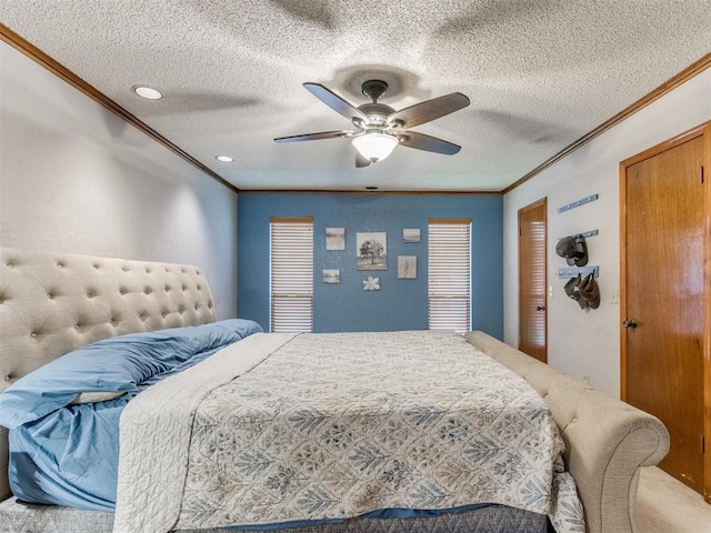 700 S Willowood Dr, Yukon, OK 73099 - bedroom with ornamental molding, a textured ceiling, light carpet, a ceiling fan, and recessed lighting