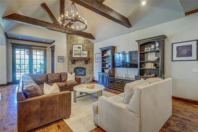9020 NW 147th Ter, Yukon, OK 73099 - living room with a chandelier, beamed ceiling, a stone fireplace, wood finished floors, and high vaulted ceiling