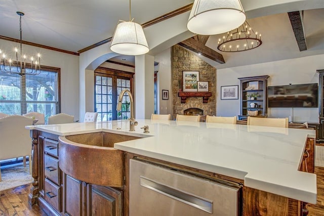 9020 NW 147th Ter, Yukon, OK 73099 - kitchen with open floor plan, a chandelier, dishwasher, and crown molding