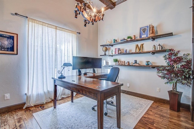 9020 NW 147th Ter, Yukon, OK 73099 - office space featuring wood finished floors and a chandelier