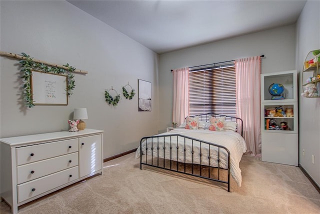 9020 NW 147th Ter, Yukon, OK 73099 - bedroom featuring light colored carpet and baseboards