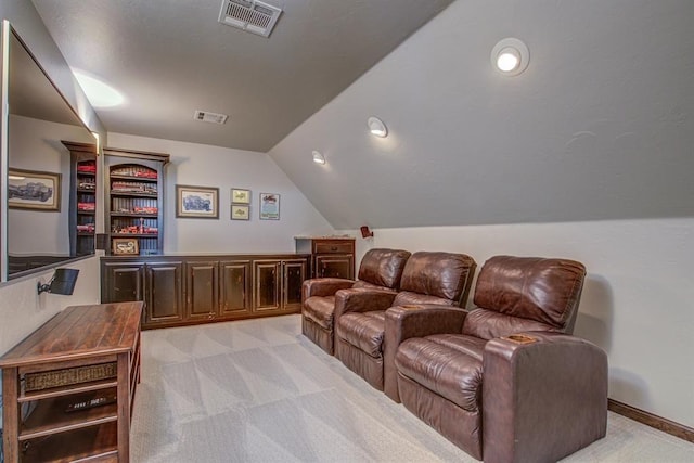 9020 NW 147th Ter, Yukon, OK 73099 - cinema room with light colored carpet and vaulted ceiling