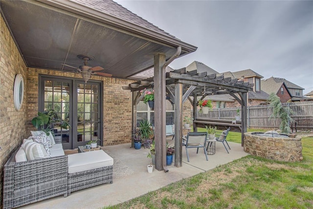 9020 NW 147th Ter, Yukon, OK 73099 - view of patio / terrace featuring french doors, a pergola, a ceiling fan, and an outdoor living space