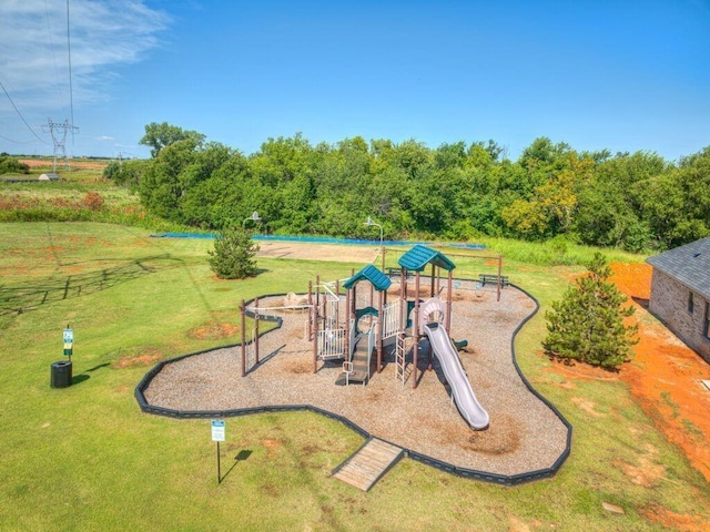 9020 NW 147th Ter, Yukon, OK 73099 - communal playground with a lawn