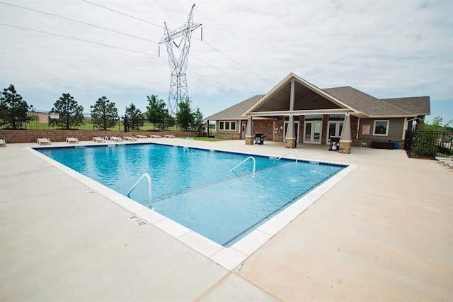 9020 NW 147th Ter, Yukon, OK 73099 - community pool featuring a patio