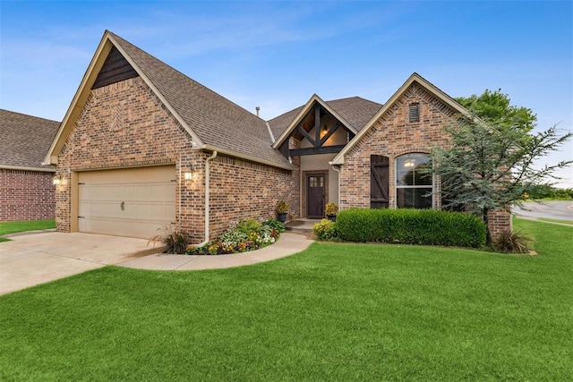 14013 Savannah River Way, Yukon, OK 73099 - view of front of house featuring brick siding, a shingled roof, an attached garage, and a front yard
