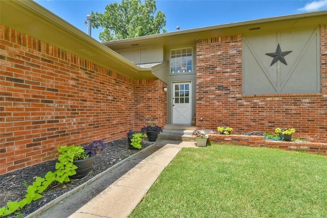 8800 Stoneleigh Ct, Oklahoma City, OK 73132 - entrance to property featuring a lawn and brick siding