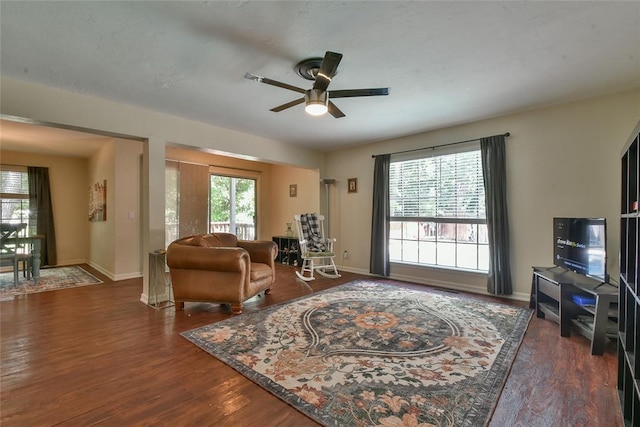 8800 Stoneleigh Ct, Oklahoma City, OK 73132 - living area featuring ceiling fan, plenty of natural light, and wood finished floors