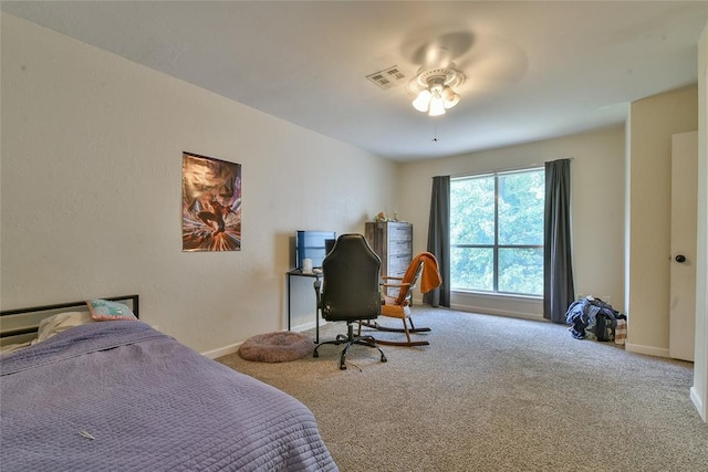 8800 Stoneleigh Ct, Oklahoma City, OK 73132 - carpeted bedroom with baseboards and a ceiling fan