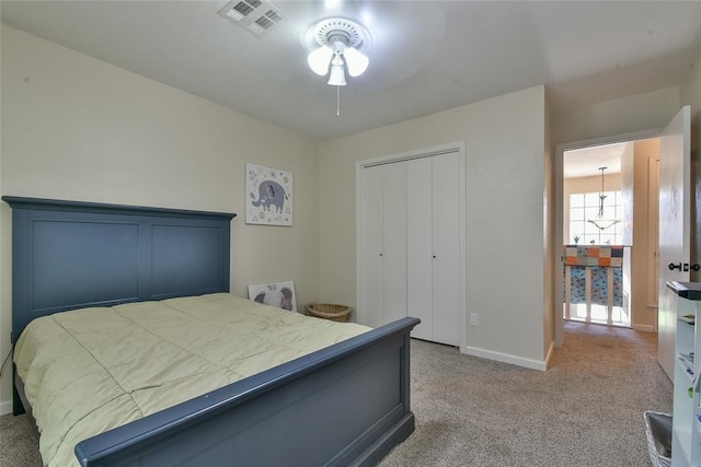 8800 Stoneleigh Ct, Oklahoma City, OK 73132 - carpeted bedroom featuring baseboards and a closet