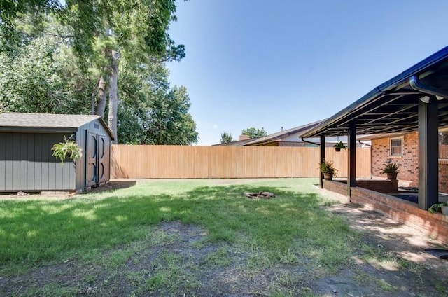 1536 Kingsgate Rd, Oklahoma City, OK 73159 - fenced backyard with a storage shed